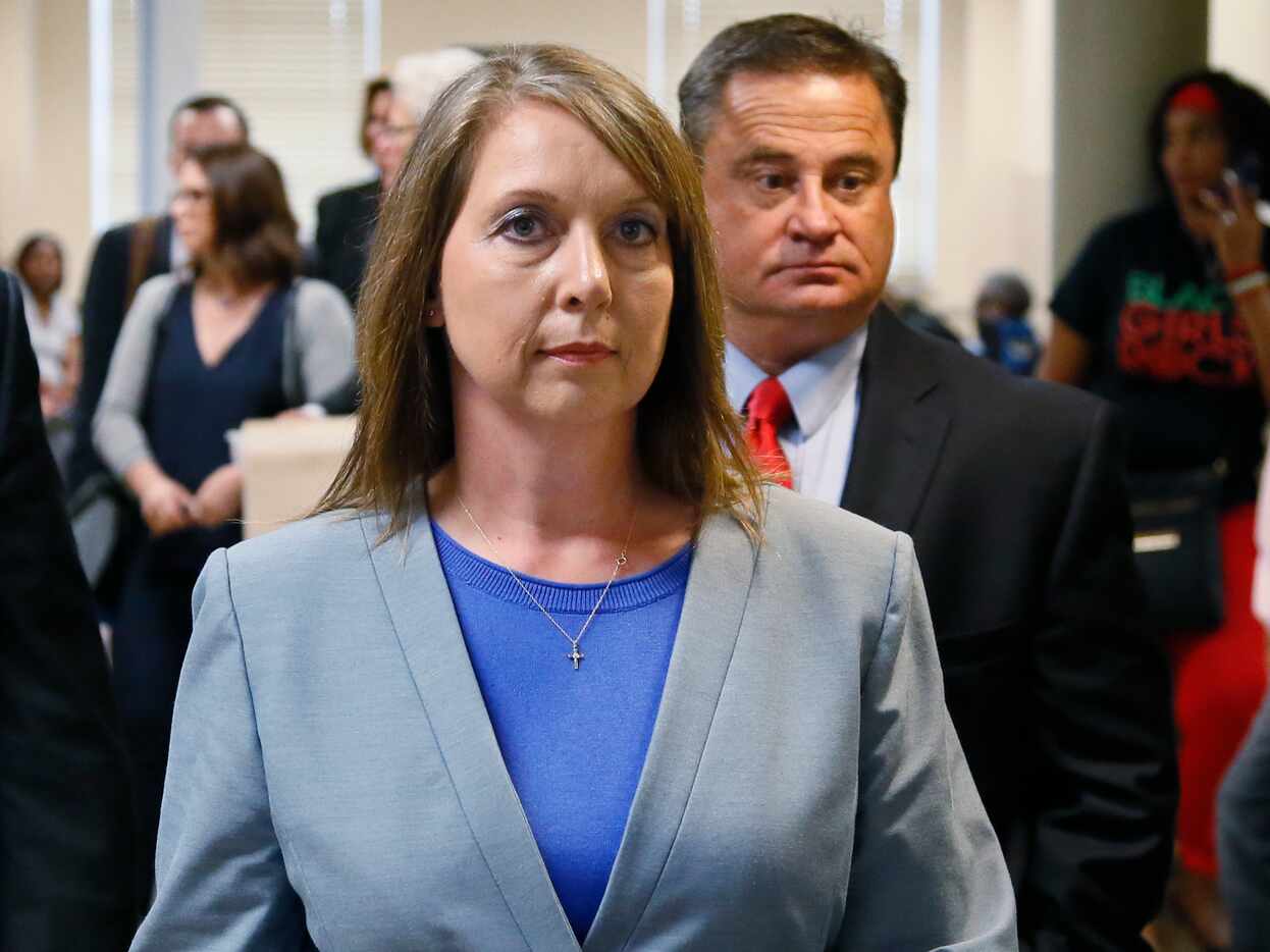 Betty Shelby leaves the courtroom with her husband, Dave Shelby after the jury in her case...