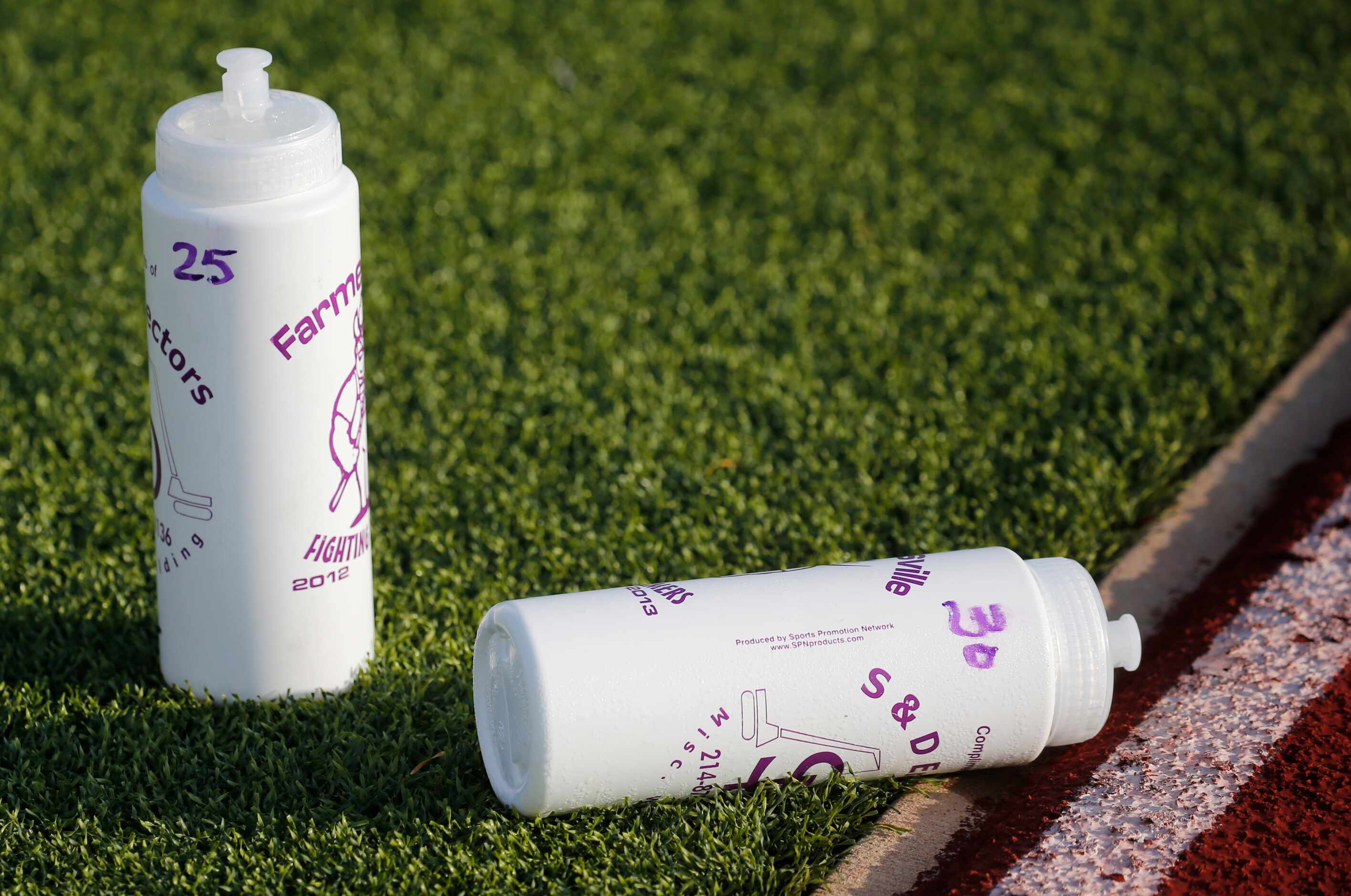 Each player has their own individually marked water bottle for use during the first day of...