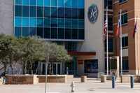 A Dallas police officer was put on paid administrative leave amid allegations he wrote “aim...