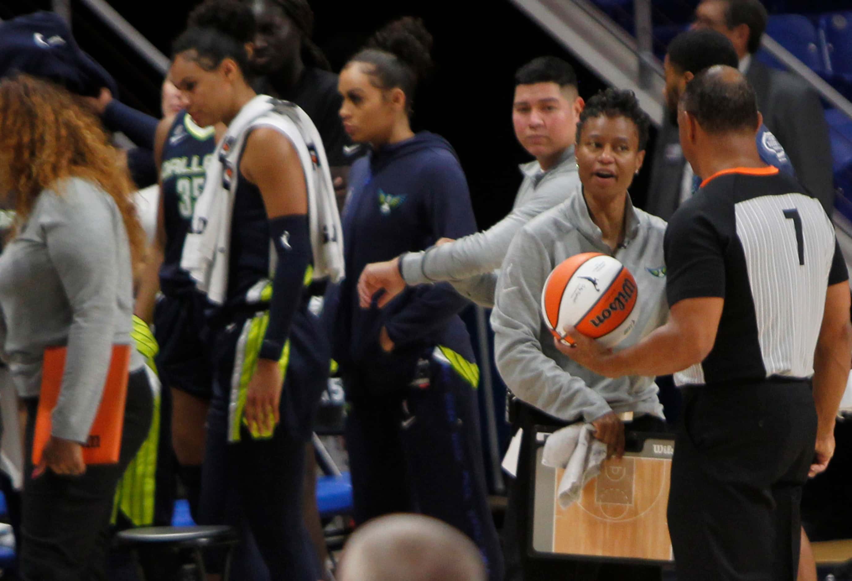 Dallas Wings head coach Vickie Johnson questions the lack of a call with a game official...