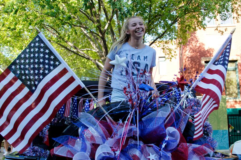 Hailey Hernandez revels in the moment as a parade planned in her honor began around the...