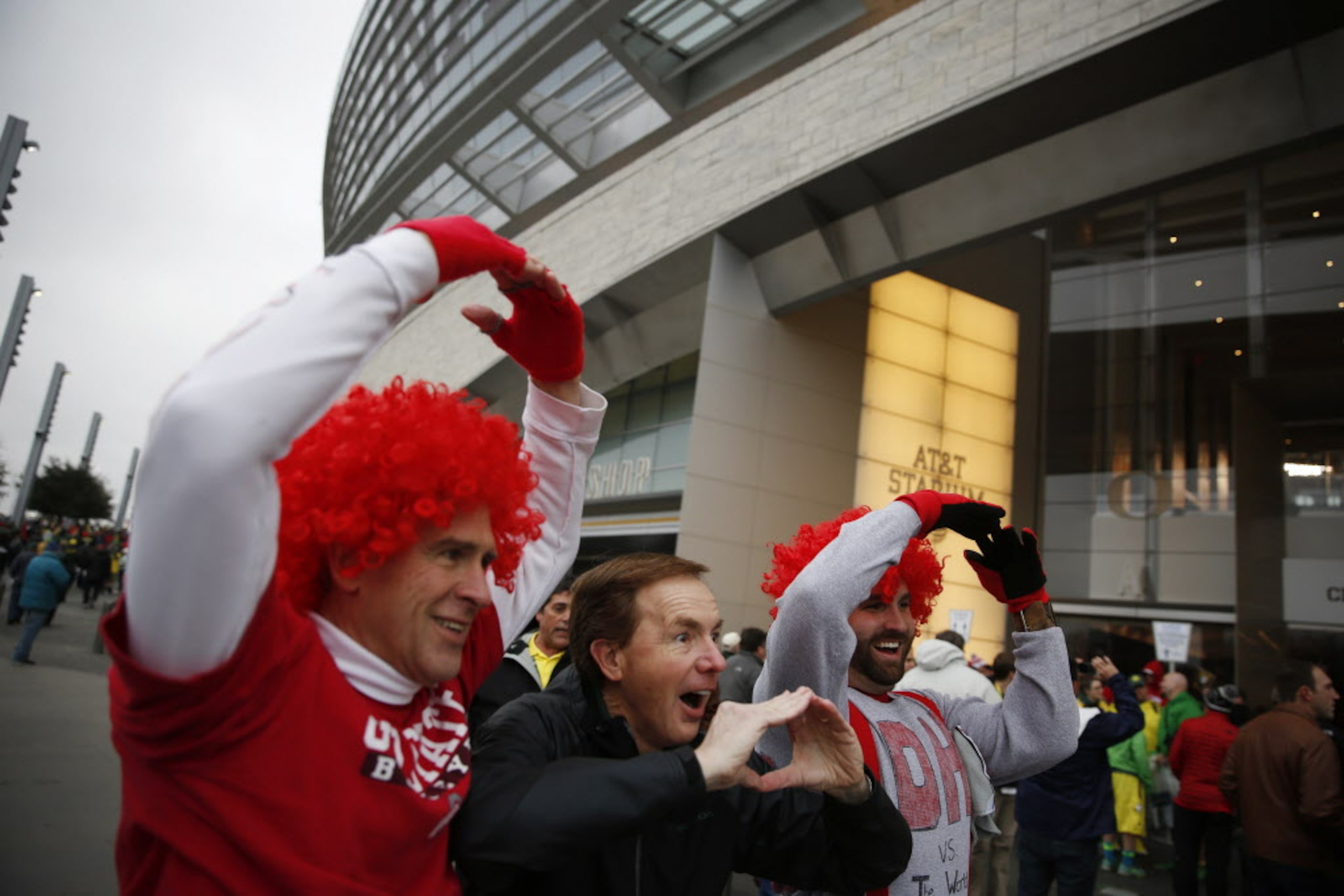 Ohio State Buckeyes fan Tom Bruckman (left) and his son, Tom Bruckman Jr. (right) pose for a...