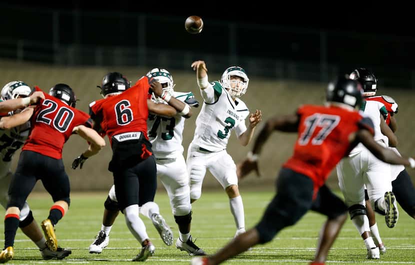 Waxahachie quarterback Bryse Salik (3) throws a second half pass against Mansfield Legacy at...