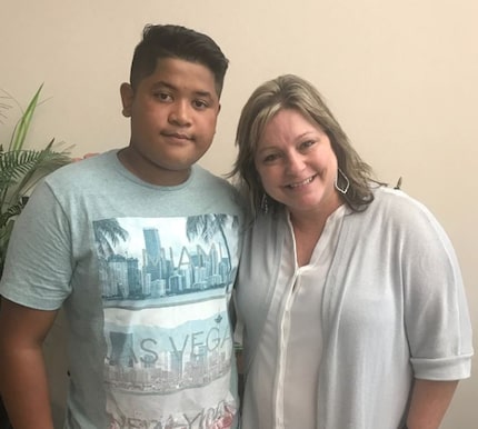 Edwin Jimenez (left) with Terry Middle School Principal Kelley Prewitt.