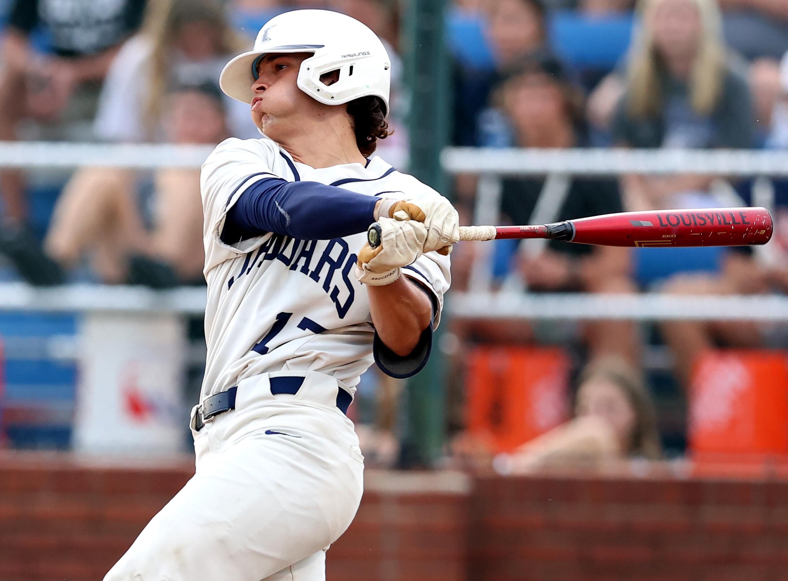 Flower Mound catcher Zane Becker takes a big swing against Denton Guyer during Game 1 of a...