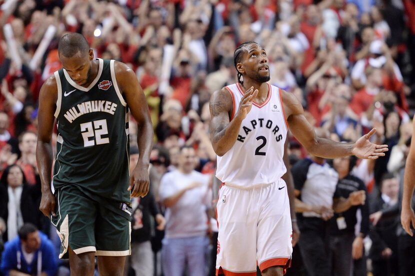 Toronto Raptors forward Kawhi Leonard (2) reacts as Milwaukee Bucks forward Khris Middleton...