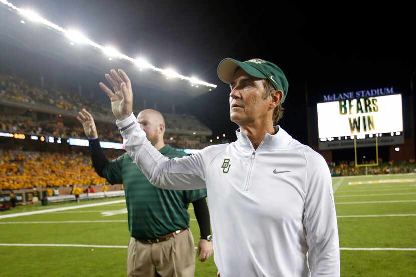 Former Baylor head football coach Art Briles joins in after-game festivities after the Bears...