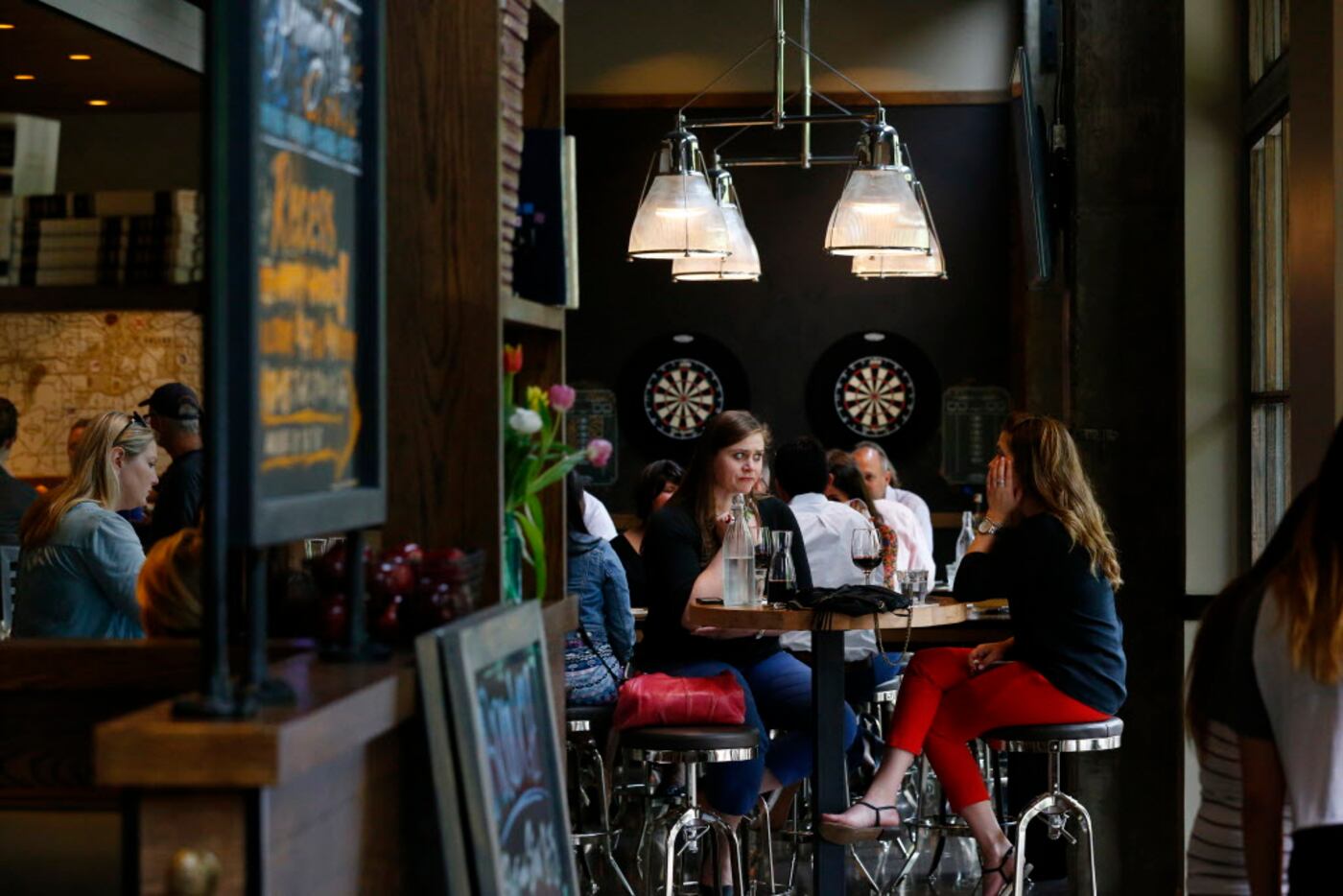 Katie Odaniel (left) and Kelly Shields have a drink after work at Public School 214  in...