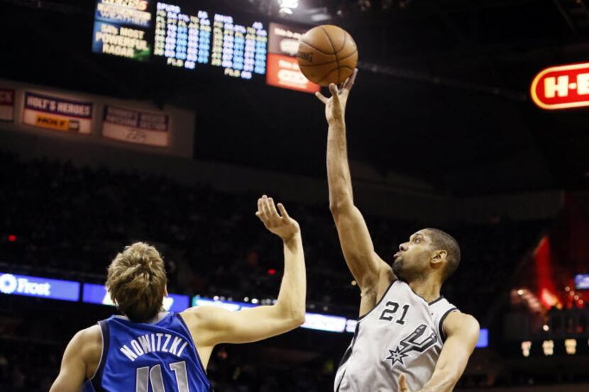 Dec 23, 2012; San Antonio, TX, USA; San Antonio Spurs forward Tim Duncan (21) takes a shot...