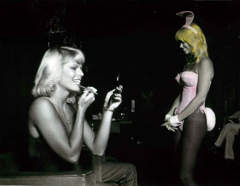 Bunny hopeful Patricia Hardy puts finishing touches on her makeup as bunny Crystal Abbott...