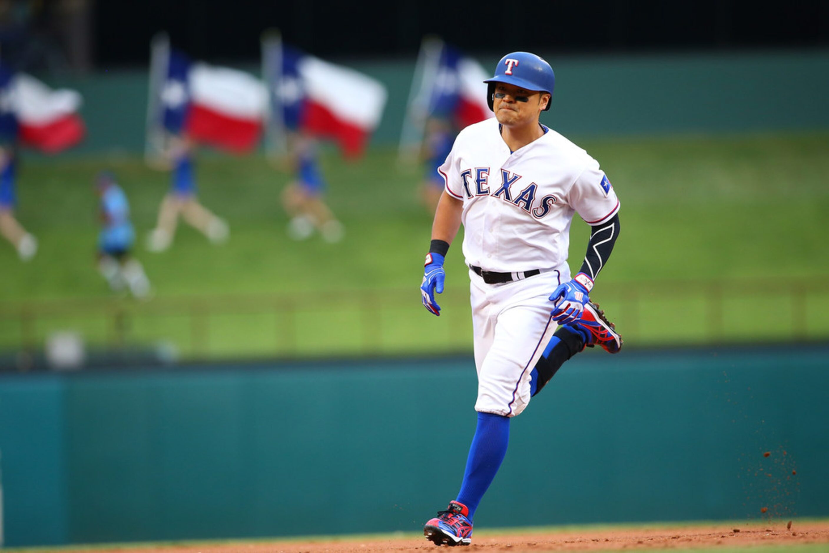 ARLINGTON, TX - JUNE 04:  Shin-Soo Choo #17 of the Texas Rangers hits a solo home run in the...