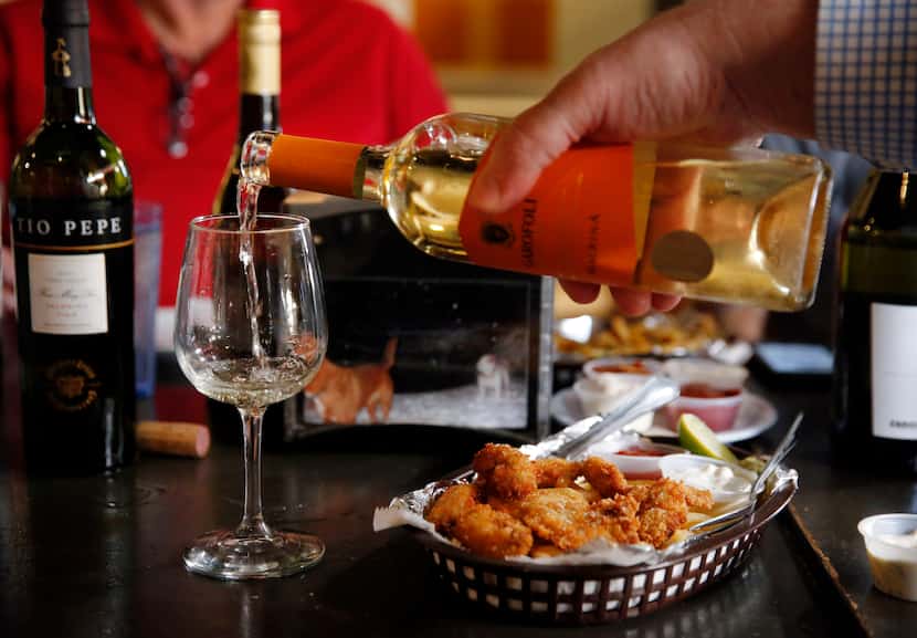 The Dallas Morning News wine panel paired wine with entrees from 20 Feet Seafood on Peavy...