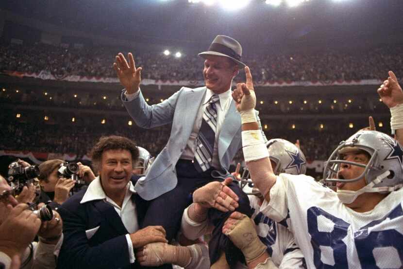 In this Jan. 15, 1978, file photo, Dallas Cowboys head coach Tom Landry is given a victory...