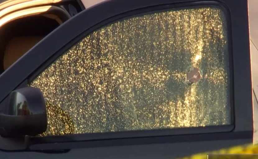 A bullet shattered the window of the black SUV in which Cabrera's body was found.