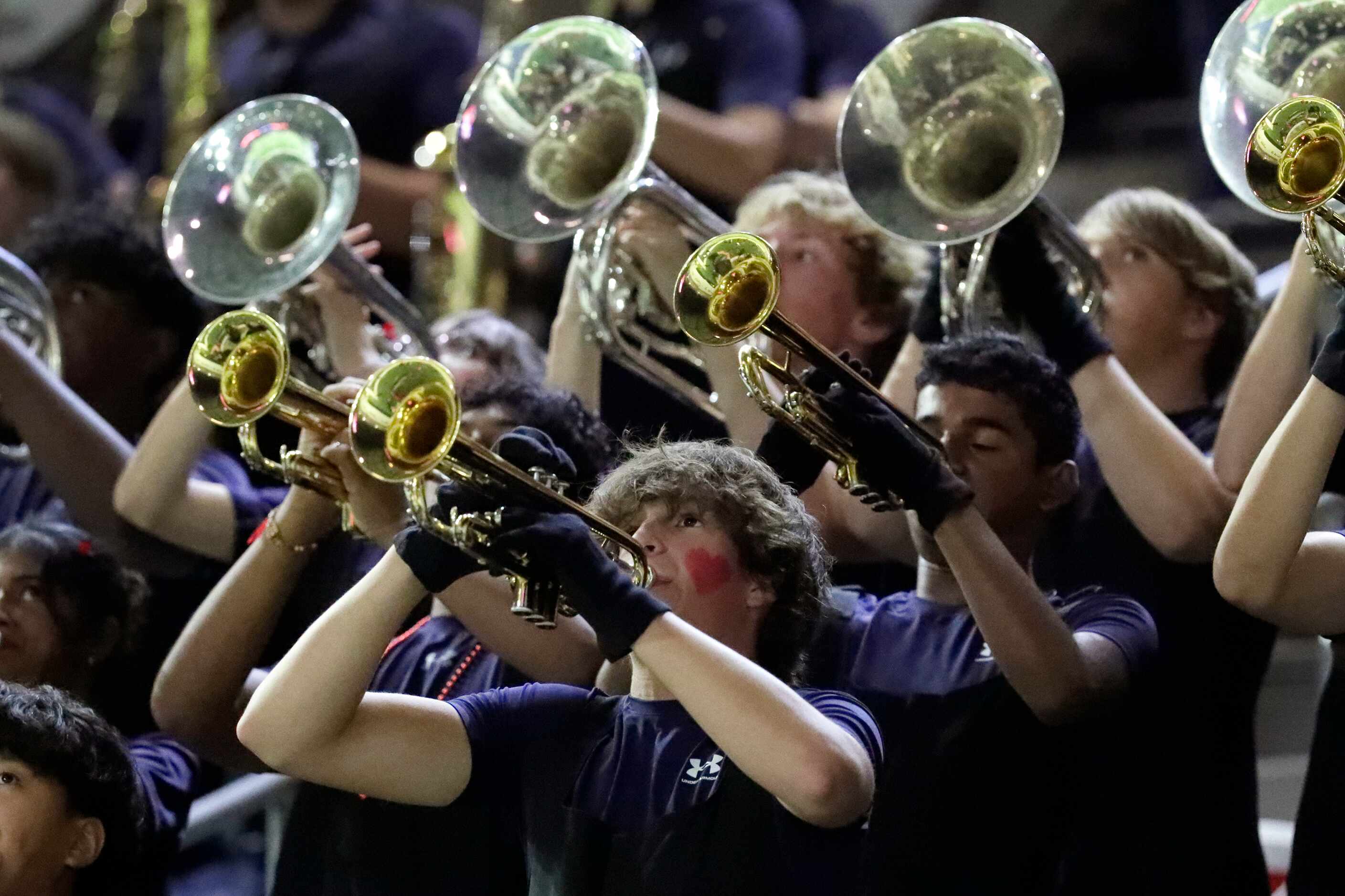 The marching band for Centennial High School plays during the first half as Frisco High...