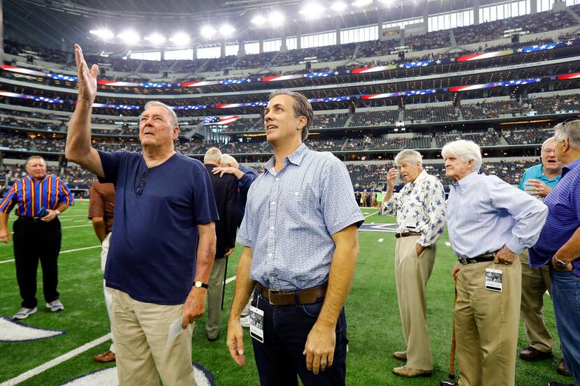 Michael Meredith, left, son of Cowboys great Don Meredith, and former Cowboys quarterback...