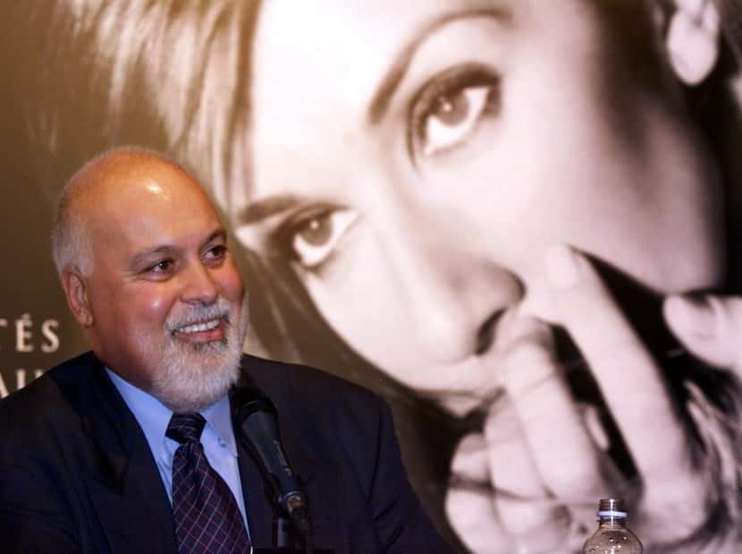 FILE - In this Sept. 8, 1999 file photo, Rene Angelil responds to a question with a giant...