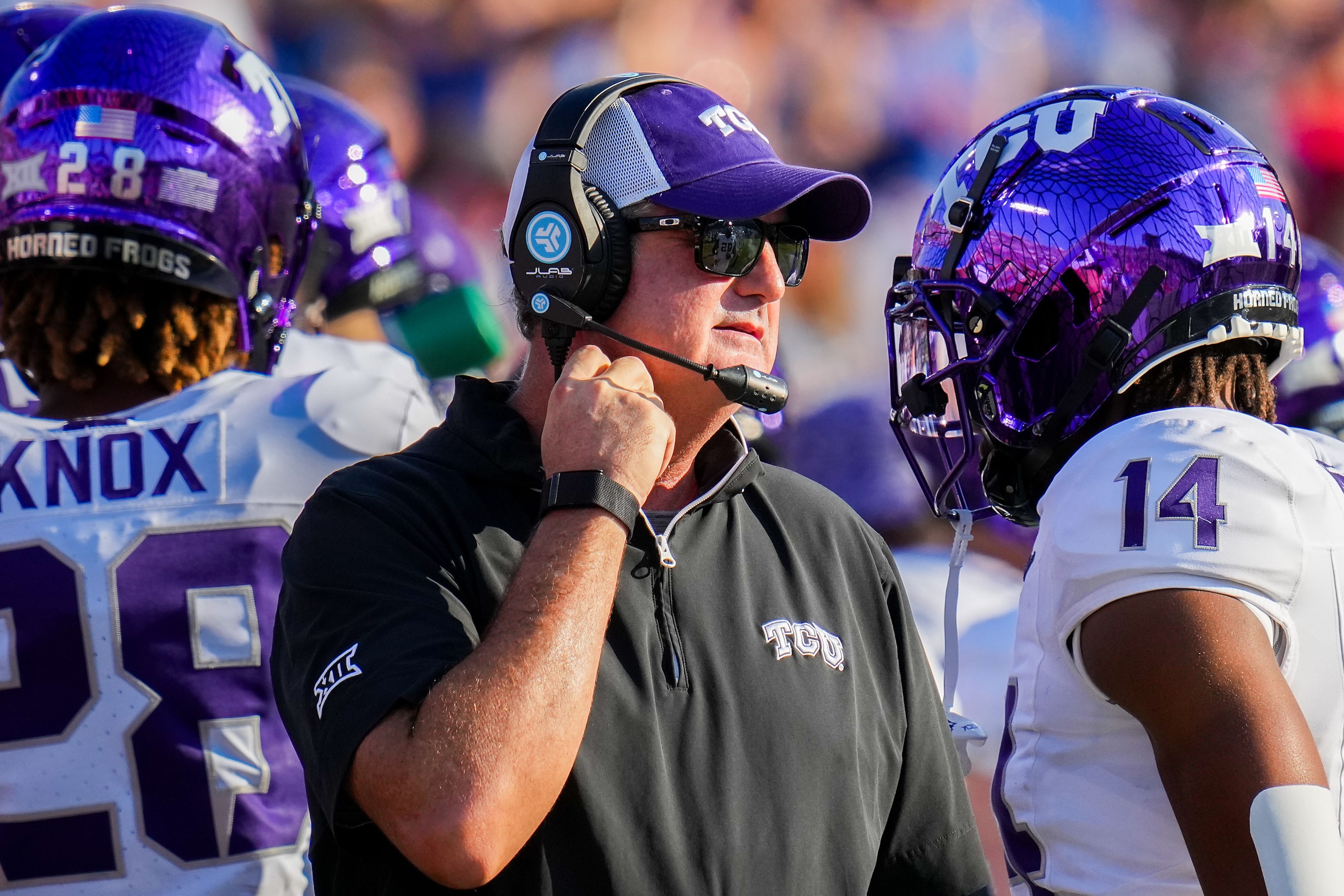 TCU head coach Sonny Dykes works on the sidelines during the first half of an NCAA football...