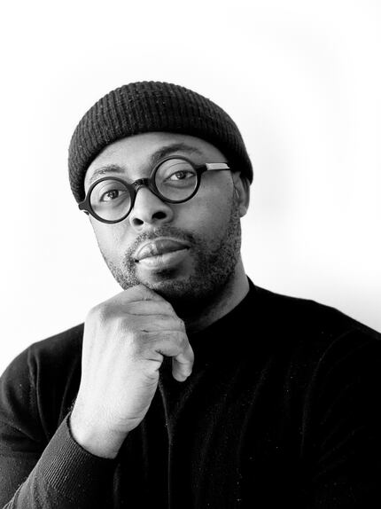 A black and white portrait of artist Jeremiah Onifadé
