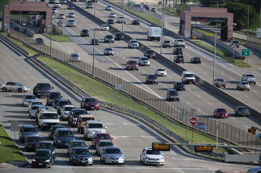 Rush hour traffic exiting the Dallas North Tollway at Tennyson Parkway in Plano in 2014. The...