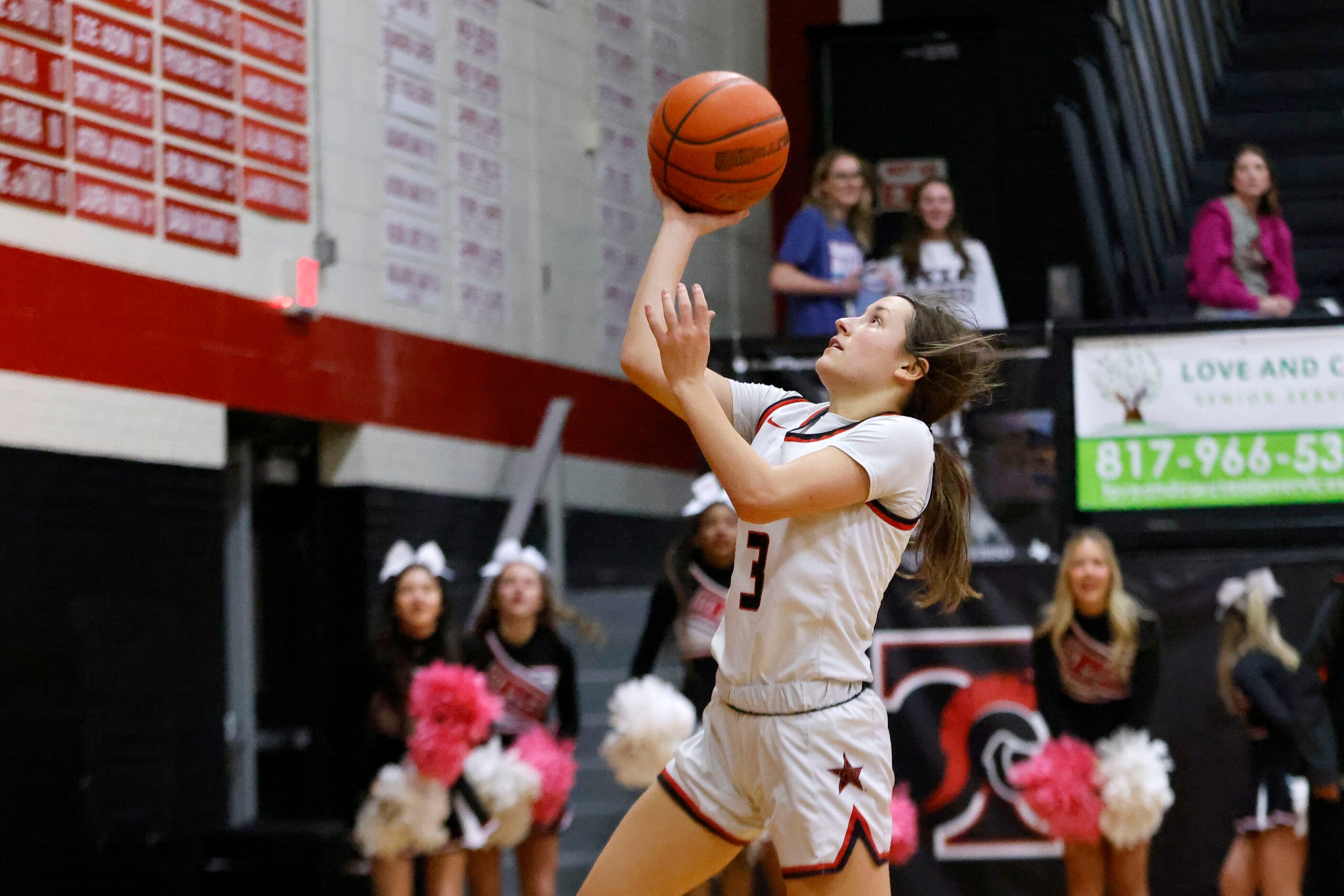 Coppell’s Macey Mercer (3) makes a layup against Highland Park during the second half of...