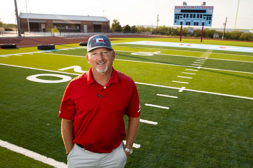Borden County High School football coach Trey Richey poses for a photo on his field on Aug....
