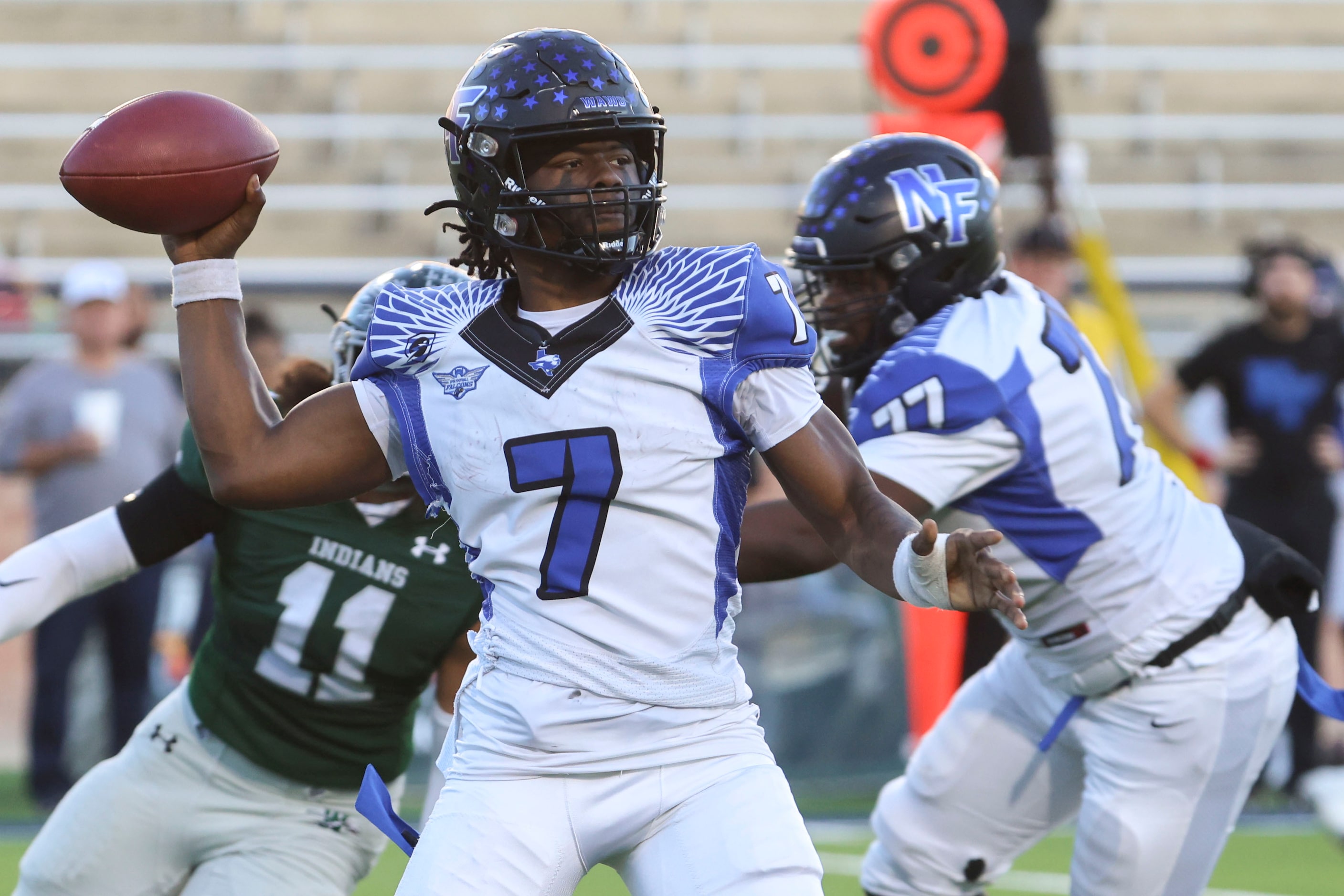 North Forney High’s QB Legend Bey throws the ball against Waxahachie High during the second...