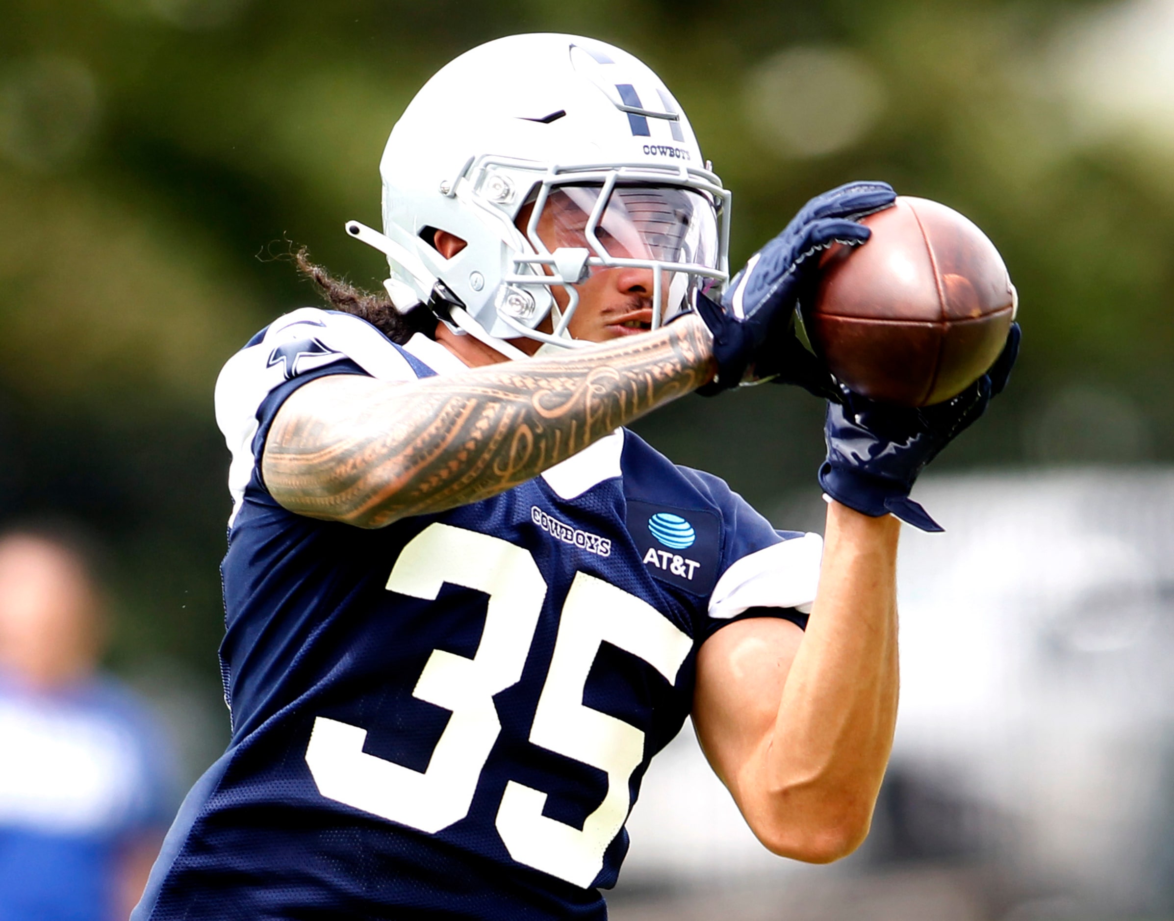 Dallas Cowboys linebacker Marist Liufau (35) pulls in a reception while crossing the middle...