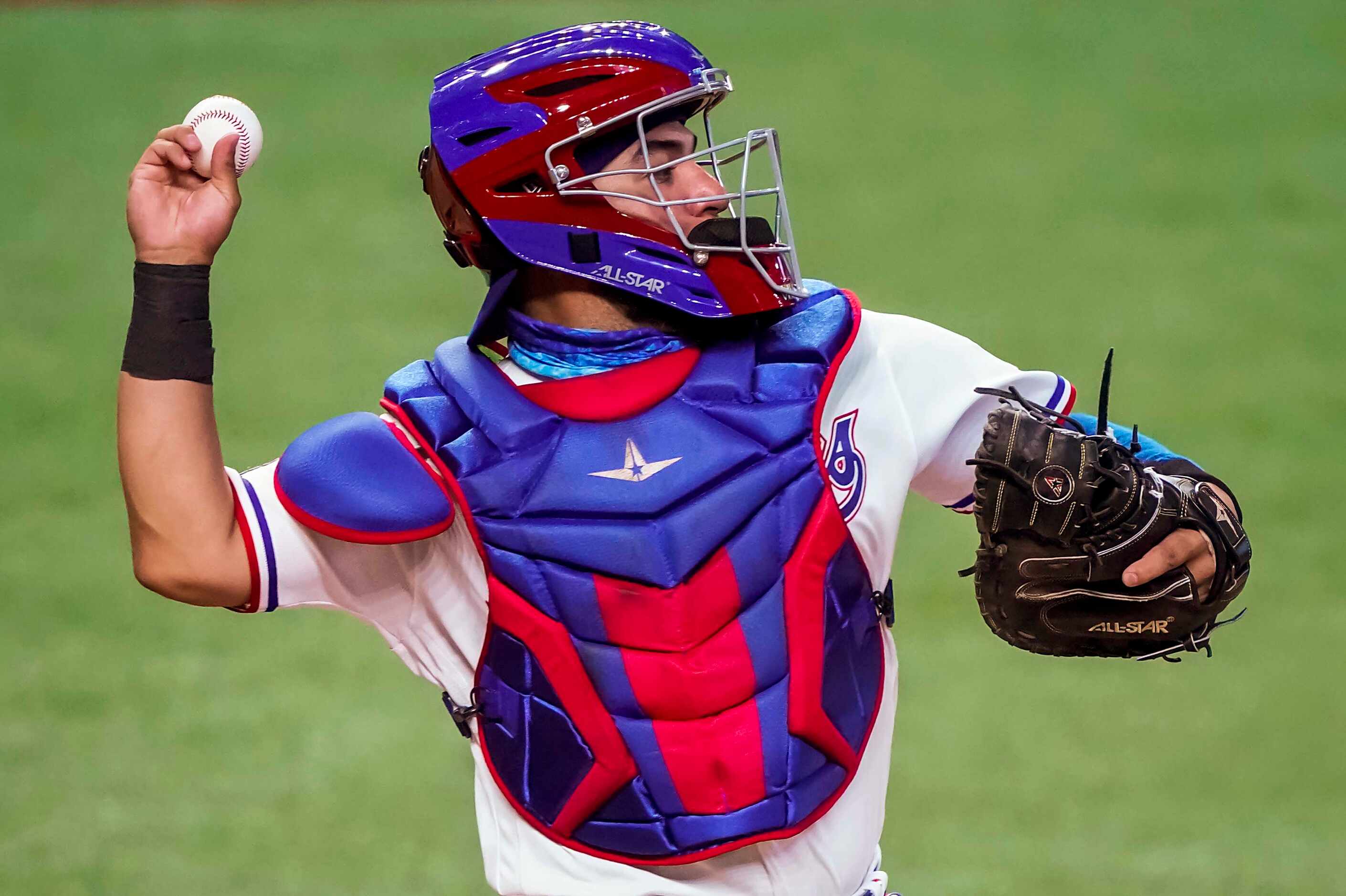 Catcher Jose Trevino makes throw to second base during Texas Rangers Summer Camp at Globe...