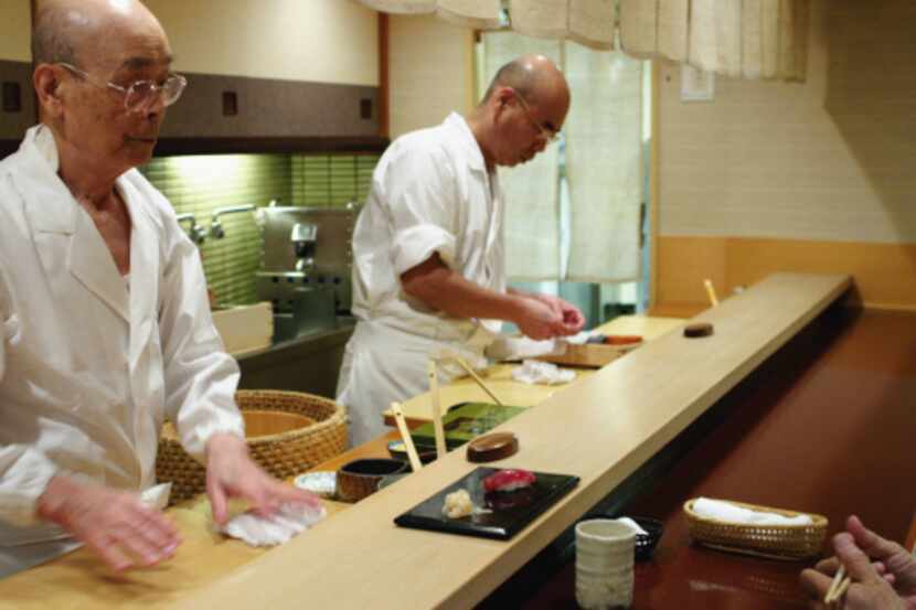 Jiro Ono and and his son, Yoshikazu Ono, in Jiro Dreams of Sushi.