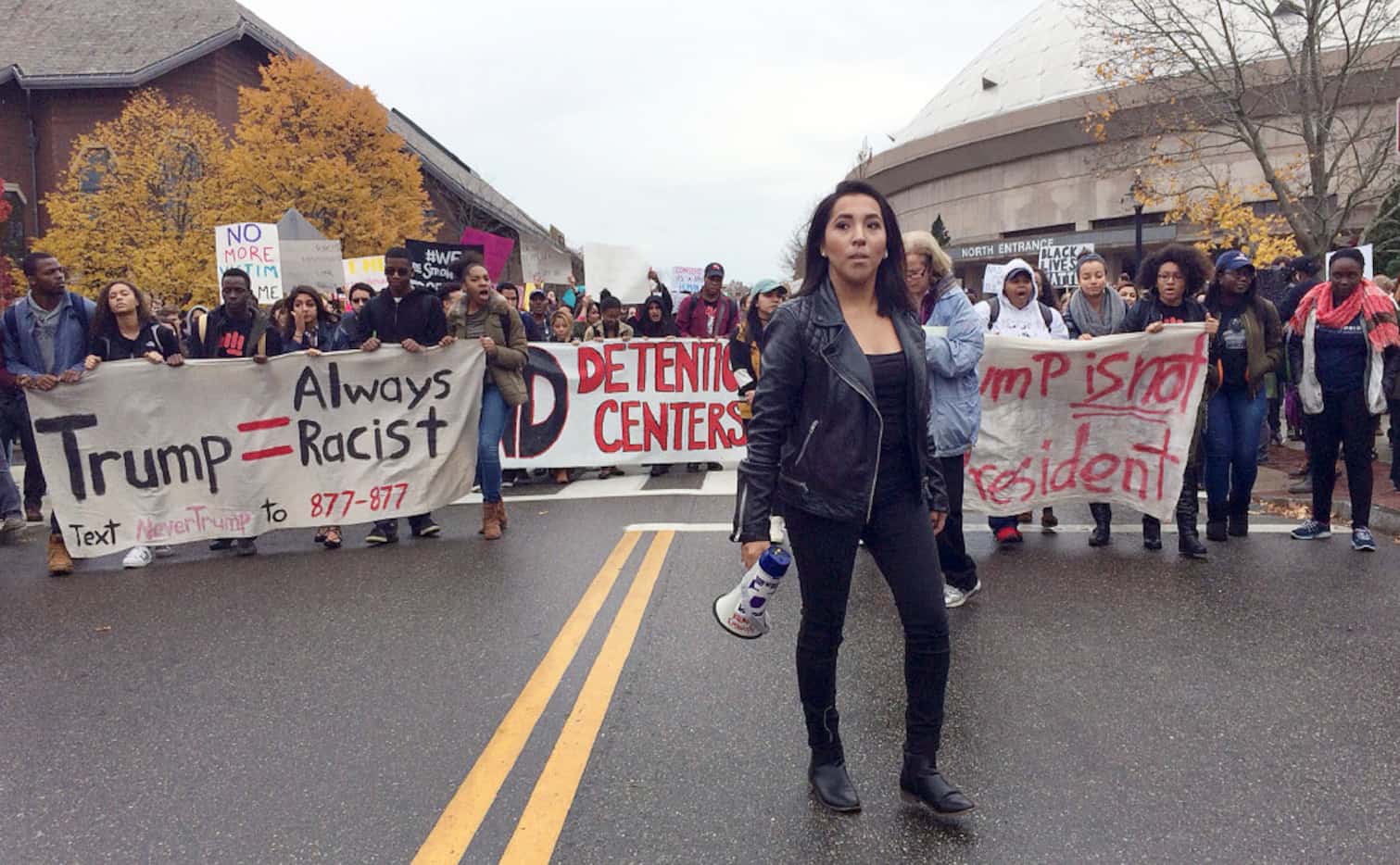 Joseline Tlacomulco leads several hundred people in a march on the University of Connecticut...