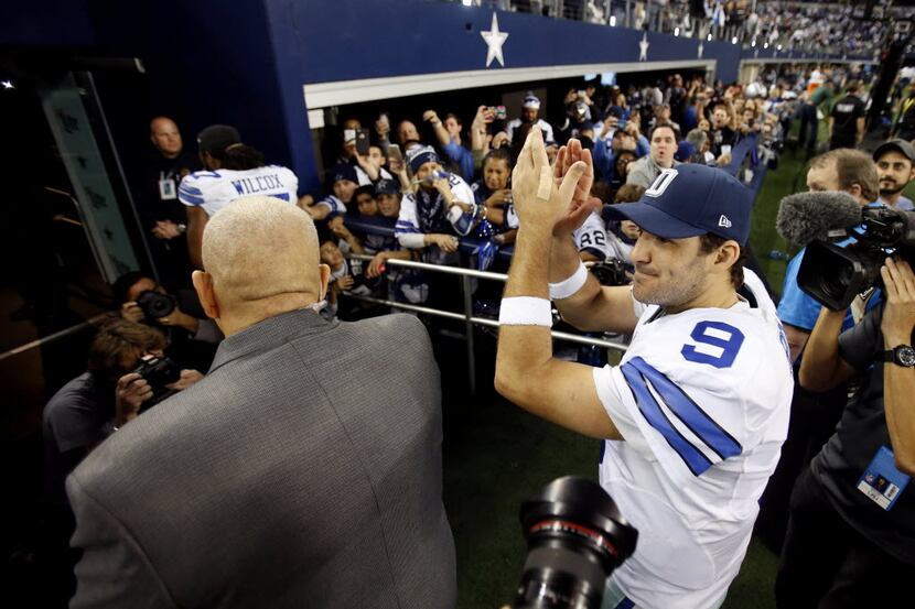 Dallas Cowboys quarterback Tony Romo (9) is all smiles after defeating the Detroit Lions in...