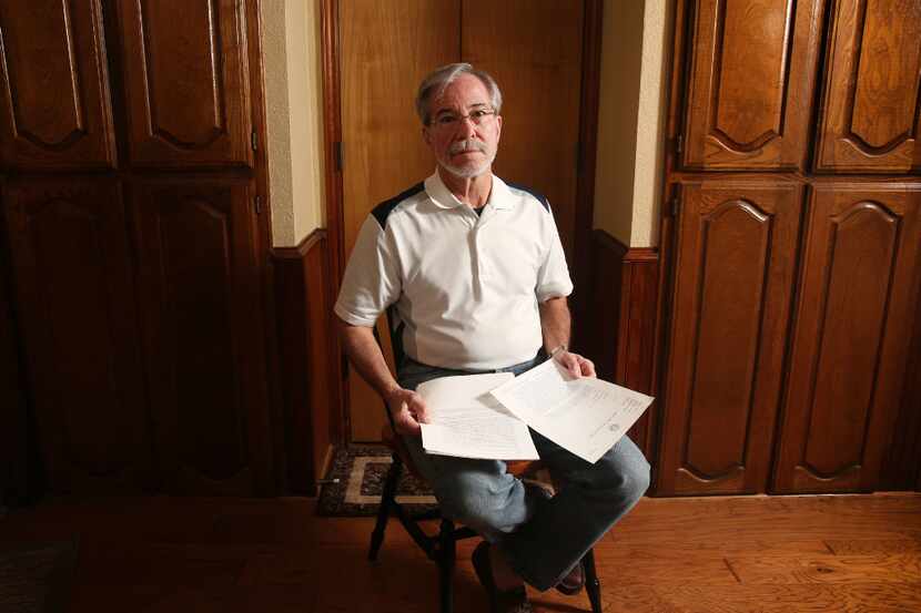 Member of the public Randy Shiflet of North Richland Hills poses with the letter he received...