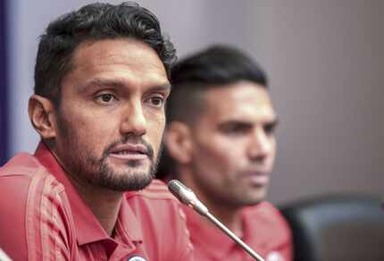 Colombia's midfielder Abel Aguilar (L) and Colombia's forward Falcao attend a press...