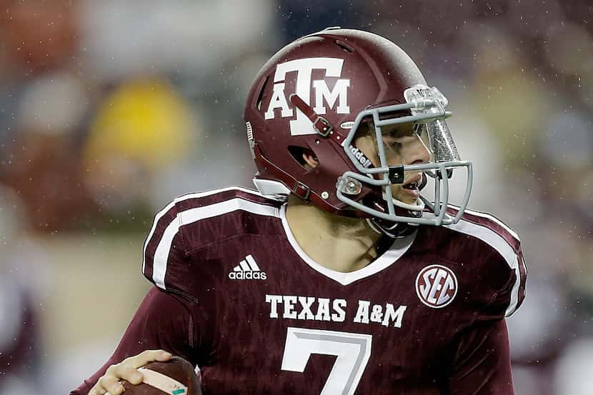 COLLEGE STATION, TX - NOVEMBER 07:  Jake Hubenak #7 of the Texas A&M Aggies looks for a...