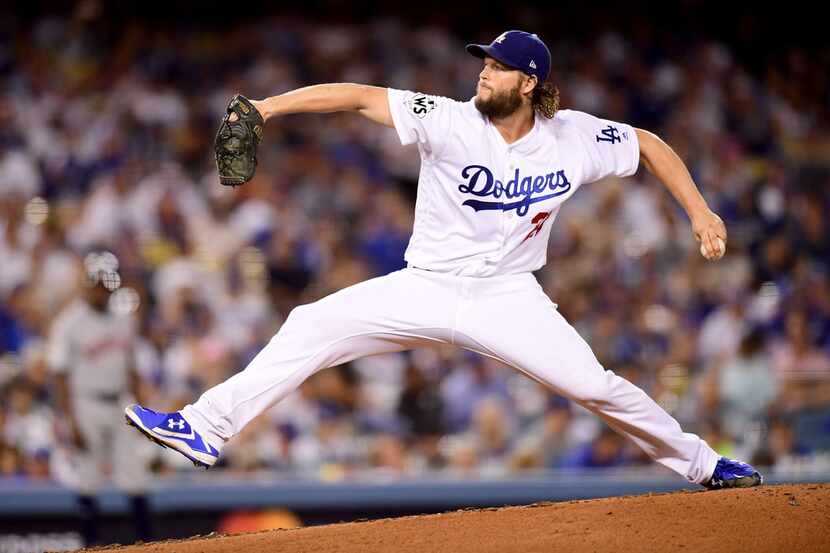 Clayton Kershaw of the Los Angeles Dodgers pitches against the Houston Astros in Game 1 of...