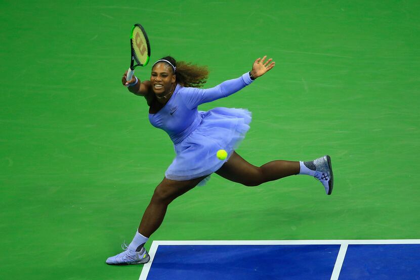Serena Williams of the United States returns the ball during her women's singles second...