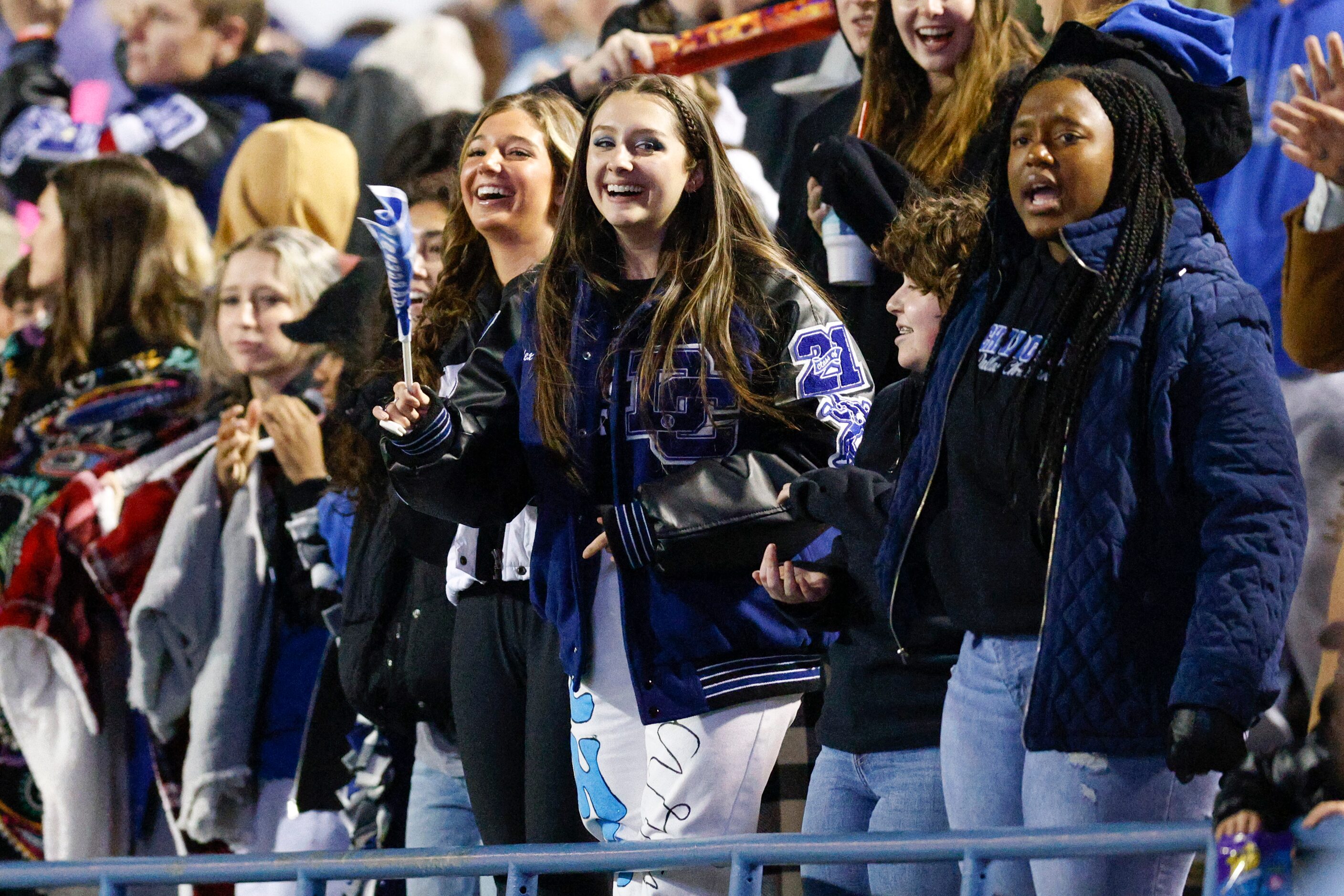 Dallas Christian fans cheer during the first half of the TAPPS Division III state...