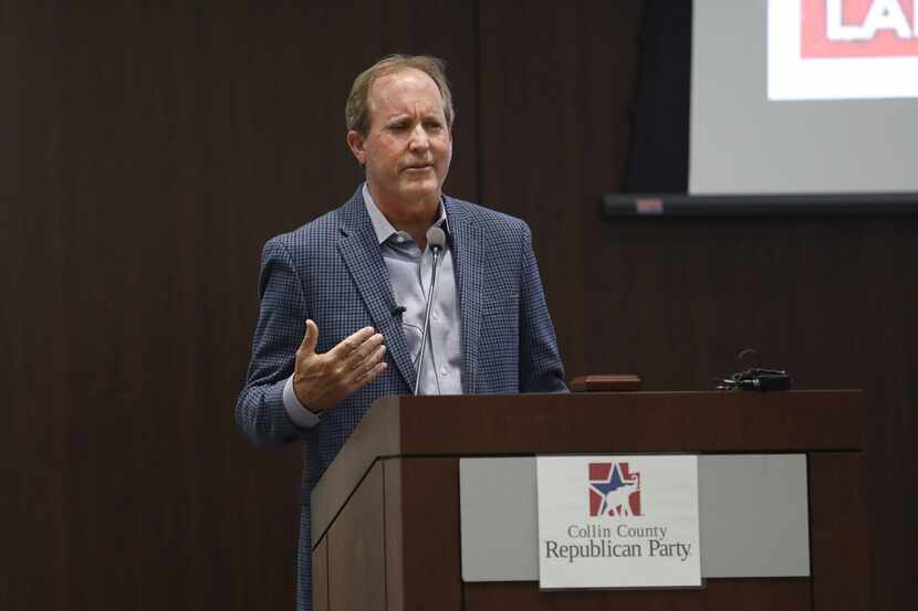 Ken Paxton speaks during the GOP County Executive Meeting at the Collin College Conference...