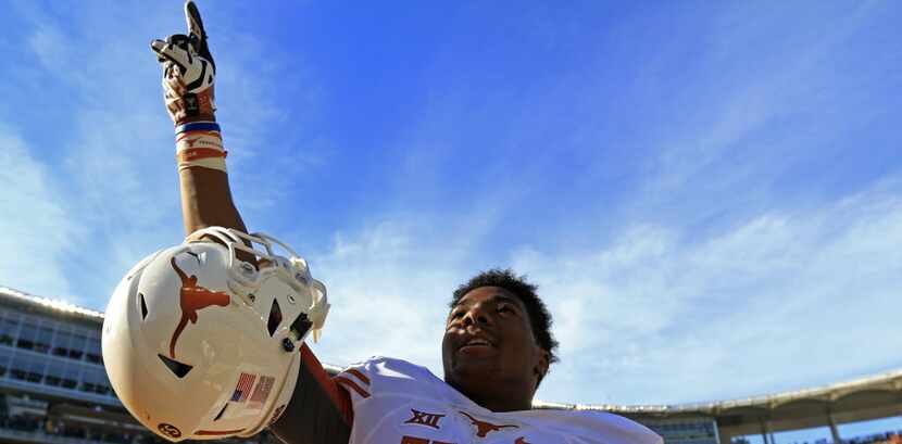 Texas wide receiver John Burt celebrates a Longhorns' 23-17 win over Baylor at McLane...