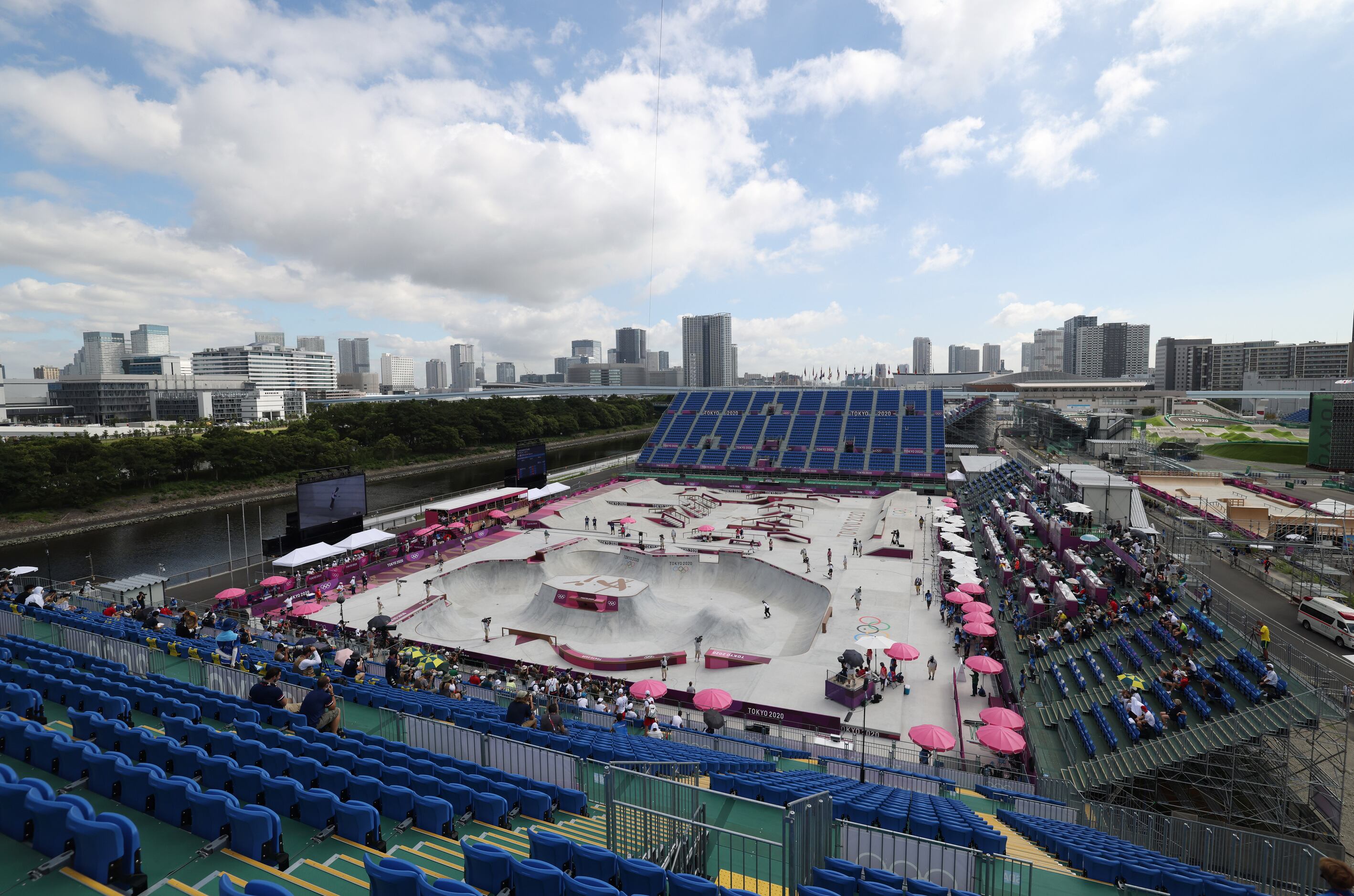 Empty seats are seen against the skyline during the women’s skateboarding prelims at the...