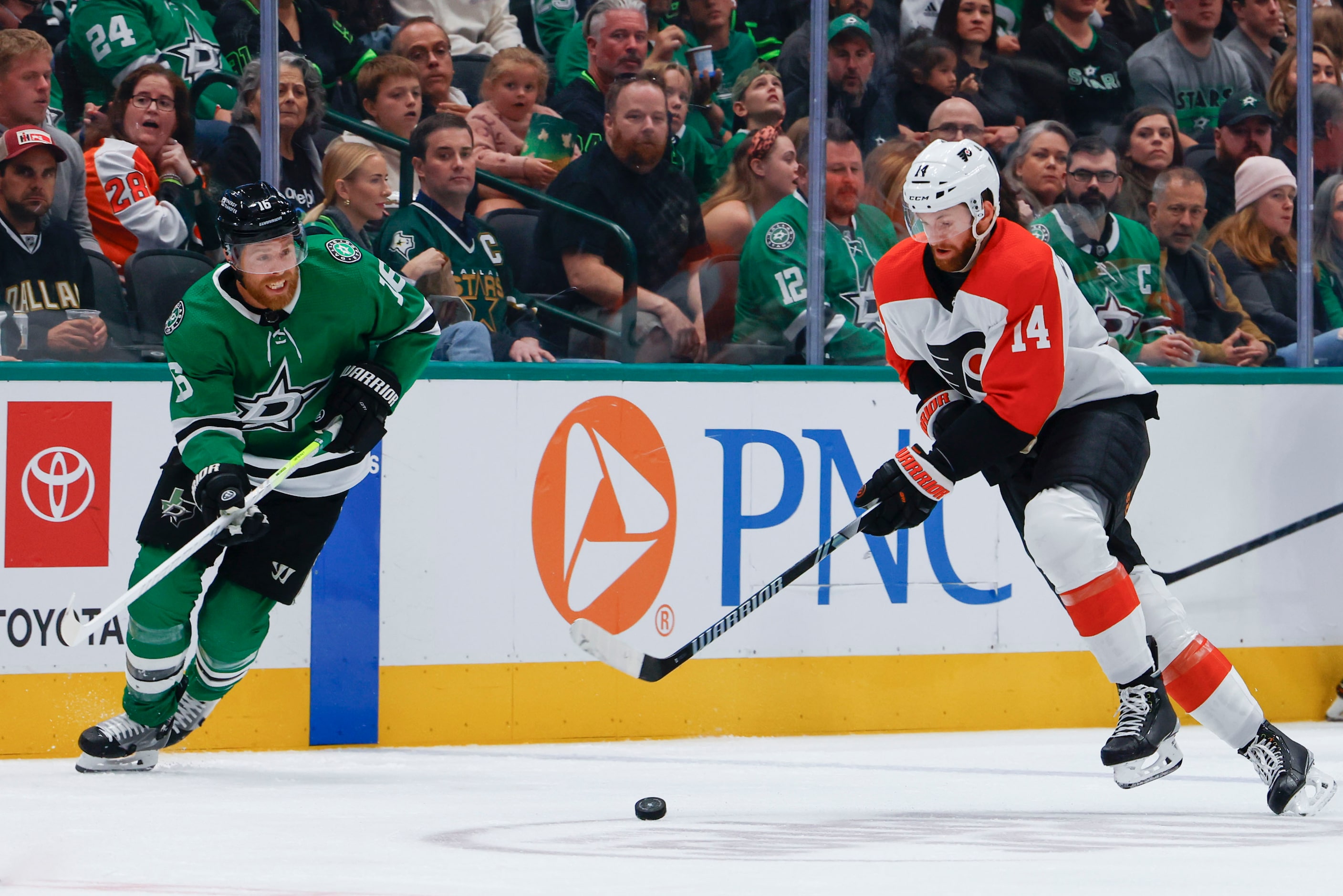 Dallas Stars center Joe Pavelski (left) skates around Philadelphia Flyers center Sean...