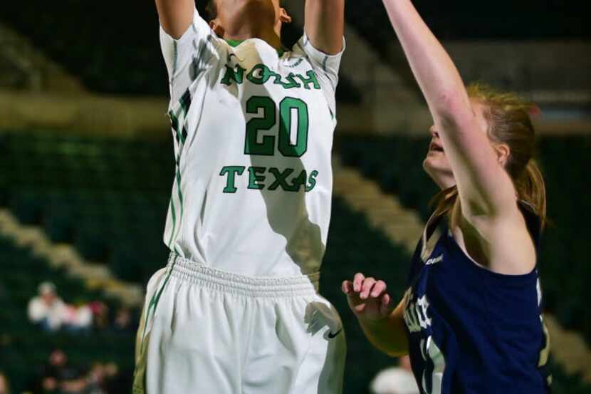 North Texas sophomore guard Terra Ellison (20) puts one up against Rice, Saturday, January...