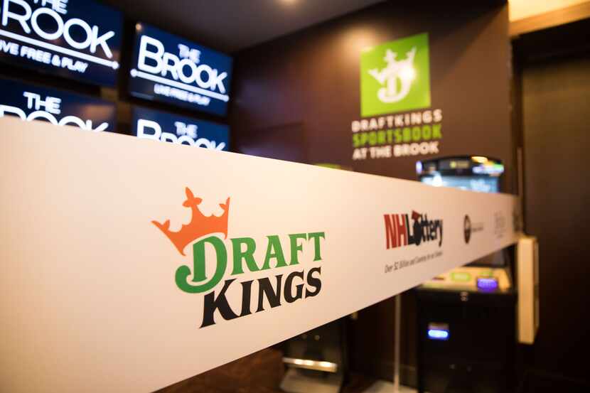 Signage at the DraftKings Sportsbook at The Brook ribbon cutting on October 23, 2020, in...