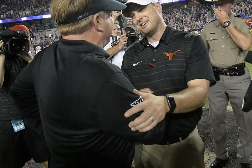Texas Christian head coach Gary Patterson, left, and Texas head coach Tom Herman shake hands...