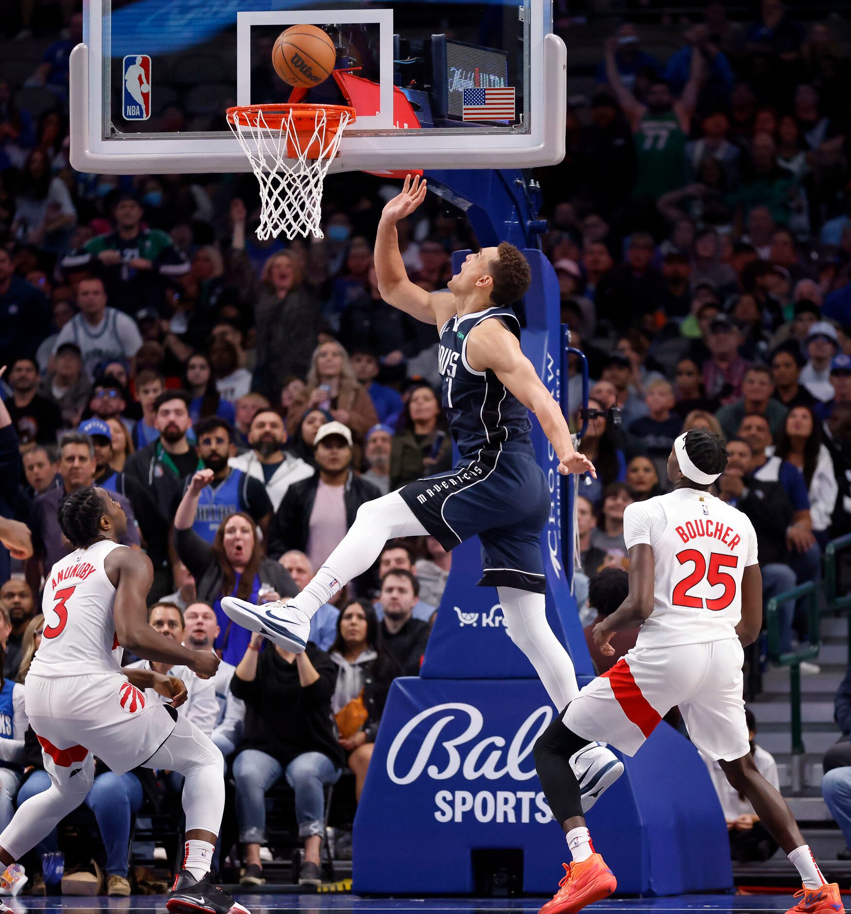 Dallas Mavericks center Dwight Powell (7) tips in a shot during the second half against the...