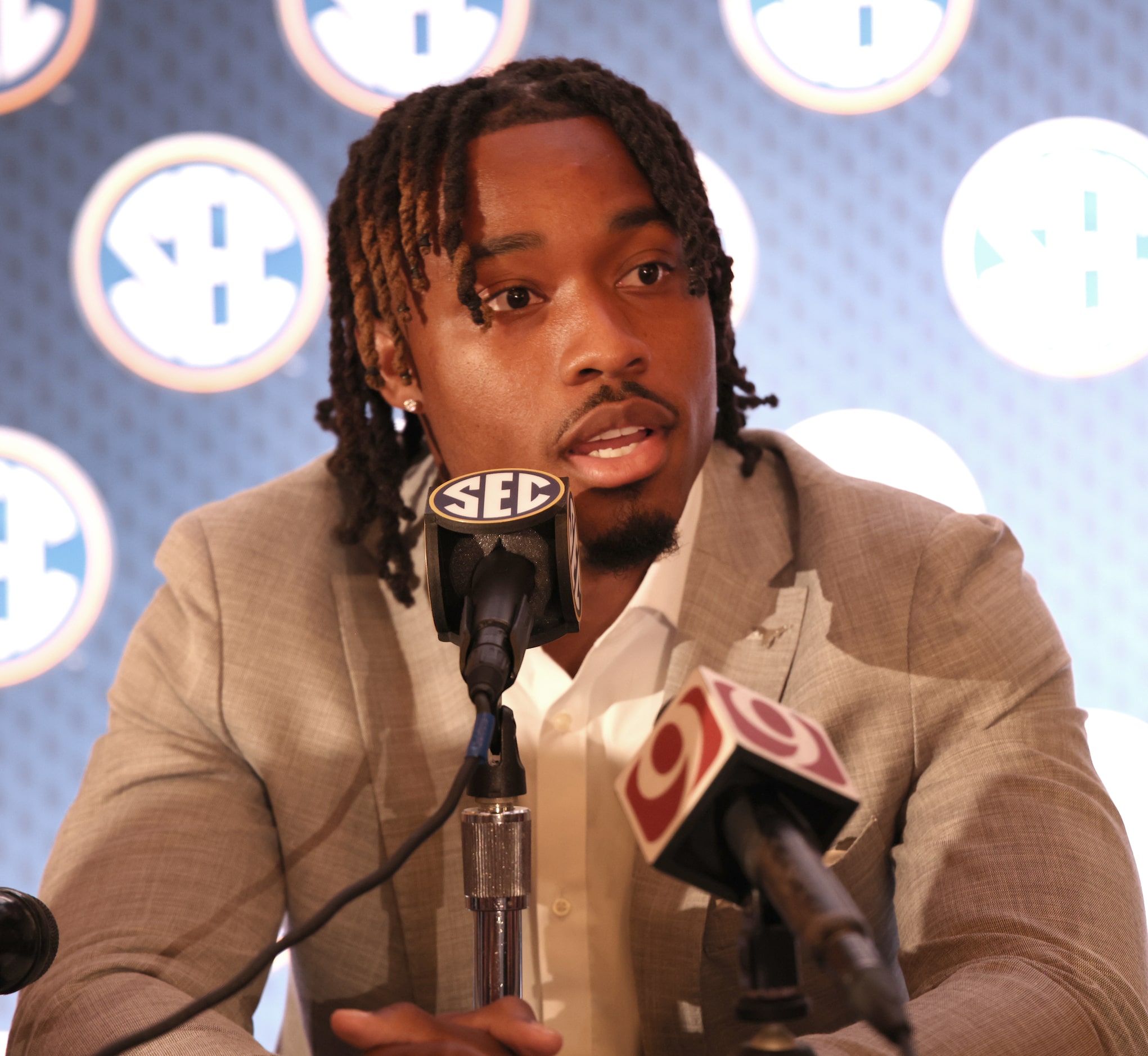 Texas Longhorns cornerback Jahdae Barron listens to a question from a media member during...