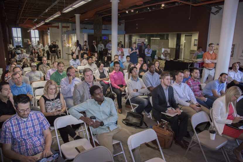 An audience listens to a startup's pitch during 1 Million Cups, a weekly event at the Dallas...