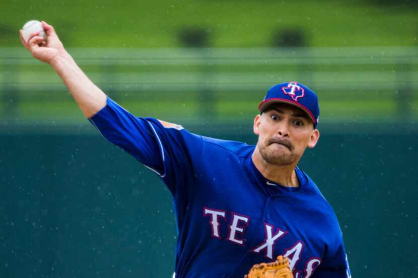 Texas Rangers starting pitcher Eddie Gamboa (78) pitches during the first inning of a spring...