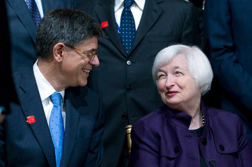 Treasury Secretary Jacob Lew speaks with Federal Reserve Chair Janet Yellen at the G-20...